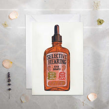 Load image into Gallery viewer, Greeting card with an illustration of a bottle labeled 'Selective Hearing' on a textured surface.
